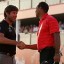 robert rock congratulated by tiger woods for winning 2012 abu dhabi championship
